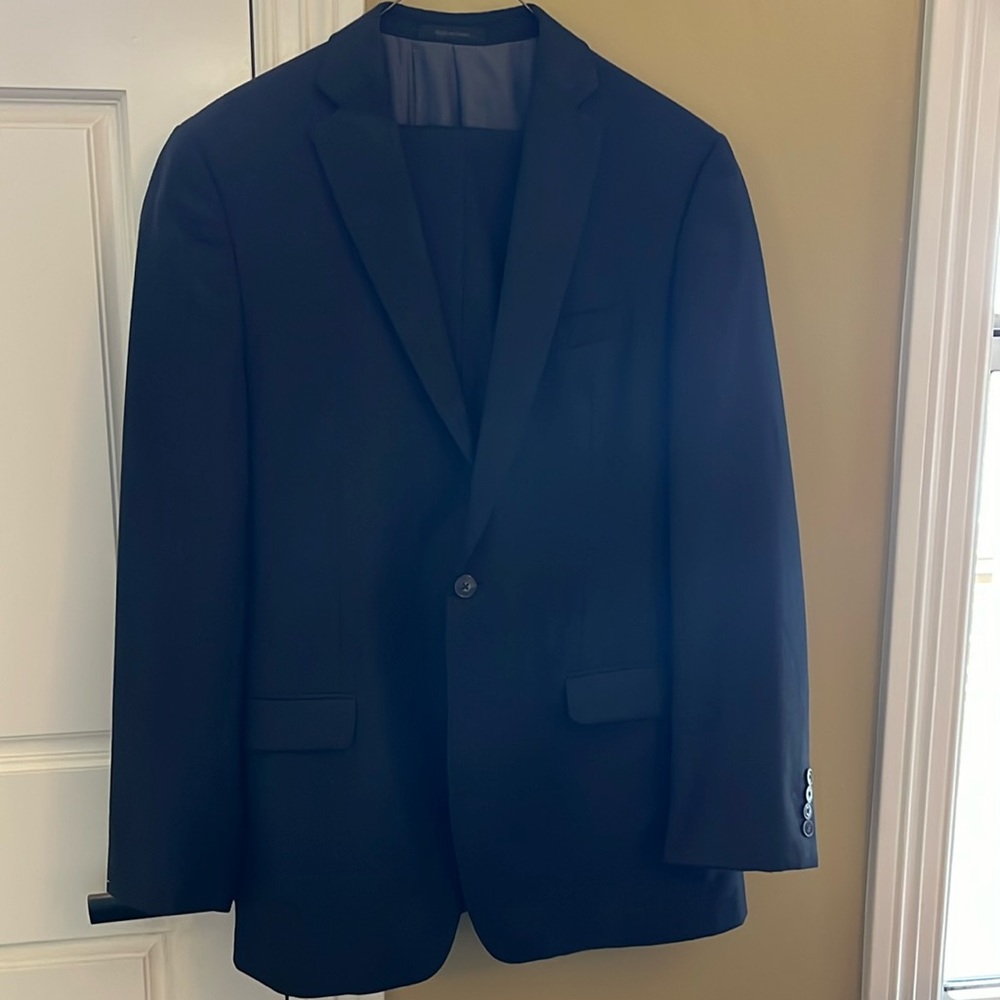 Calvin Klein men’s suit; jacket- 40L; pants 34L; charcoal gray